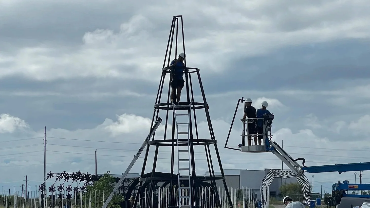 Lift and tree frame used for a large commercial Christmas light install
